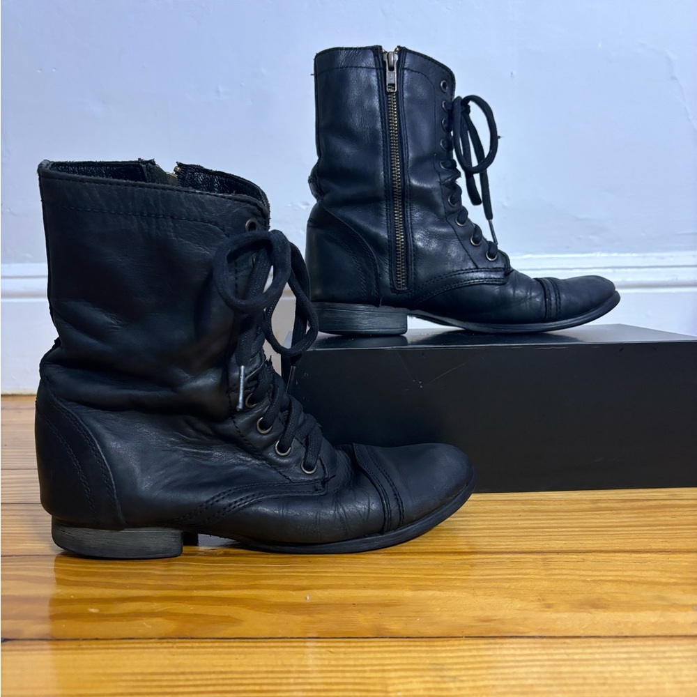 Steve Madden lace up black boots.
